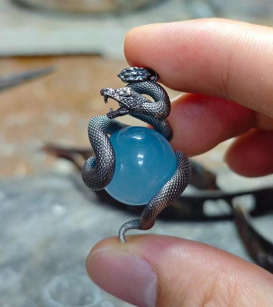 Crystal mini sphere snake pendant